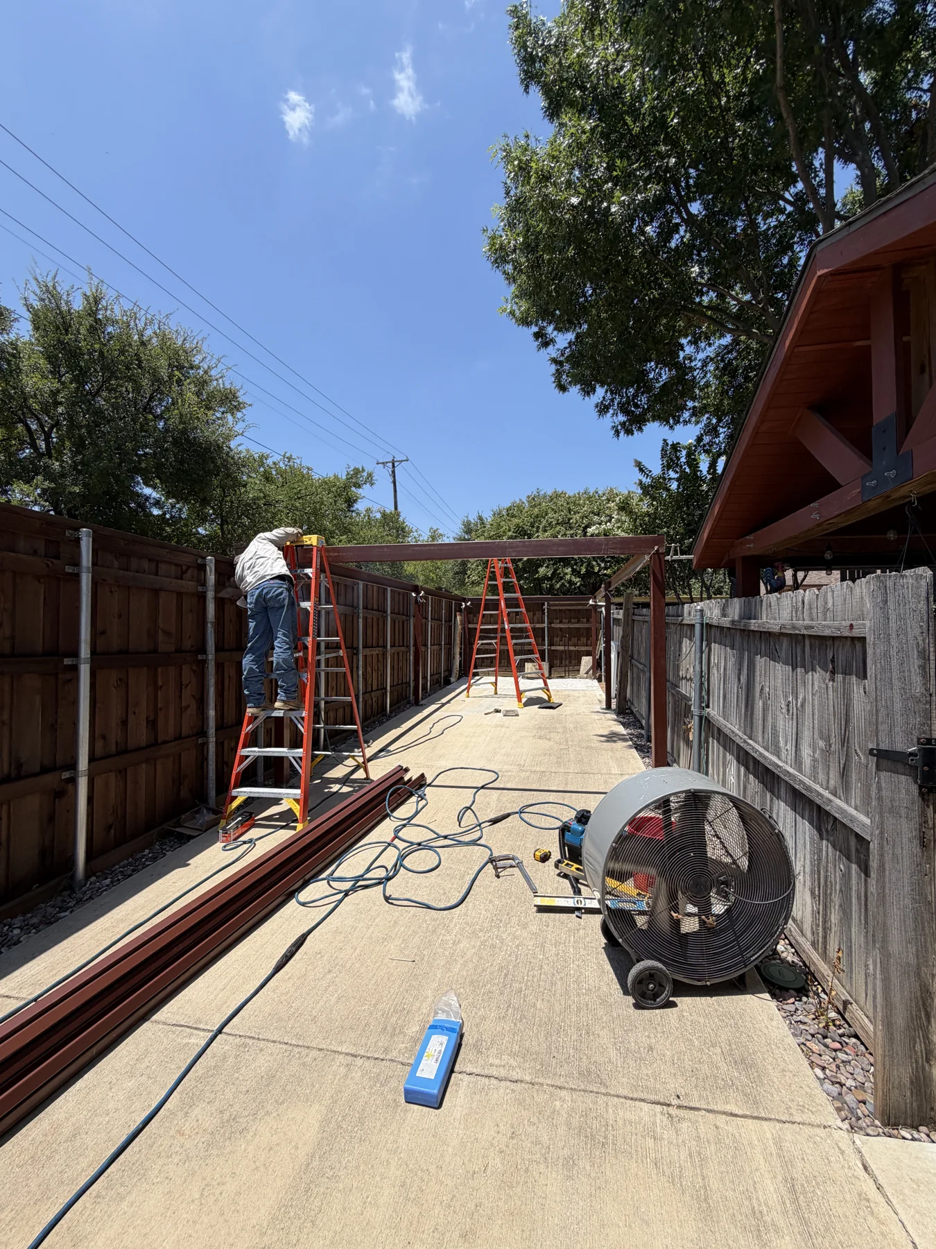 Red iron lean-to carport